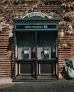 Classic telephone booths in Seoul showcasing vintage design and technology.